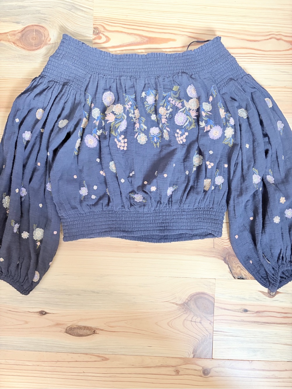 Embroidered Smocked Off-Shoulder Blouse in Slate Blue. Free People. Size m